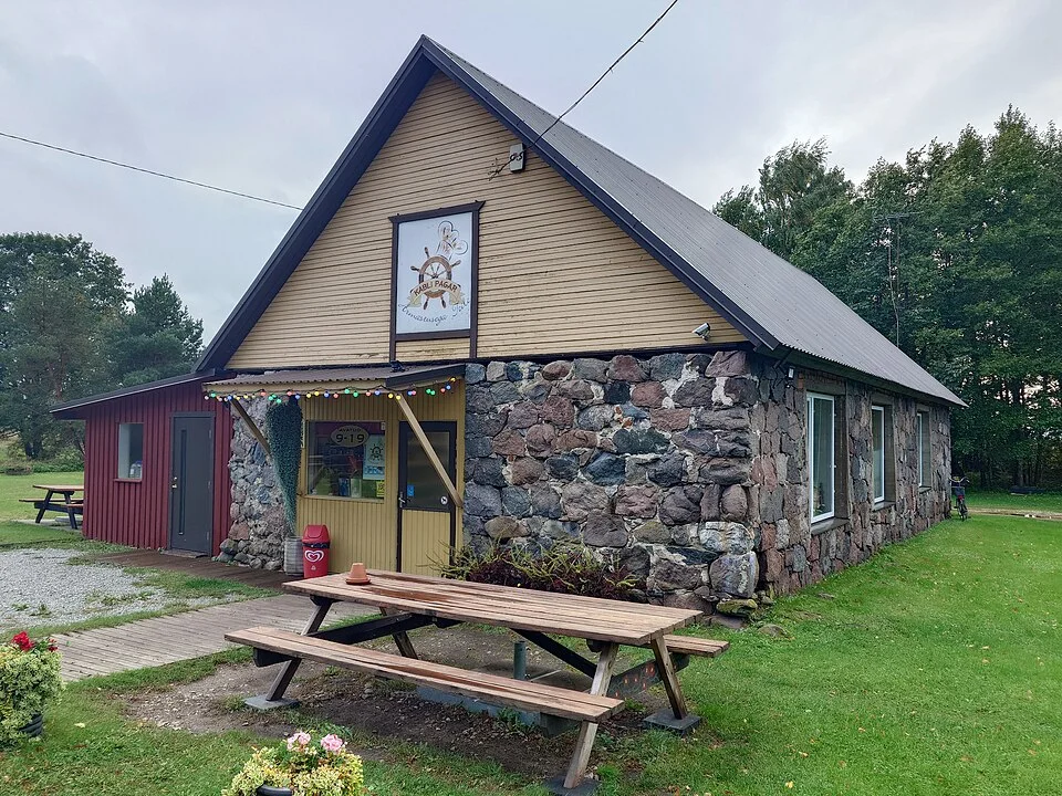 Kabli Pagar bakery and store in a stone-and-timber building