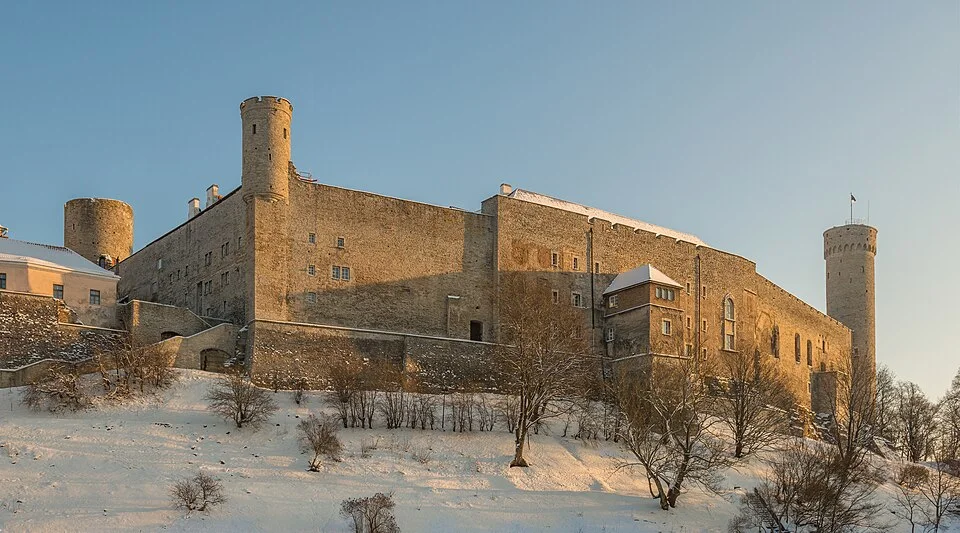 Stone walls and towers of Toompea Castle in snow