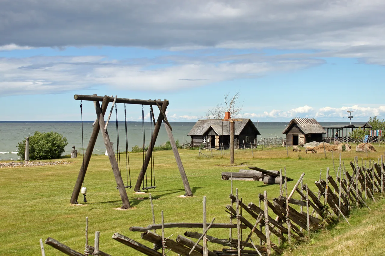 Historic coastal buildings and swing at Viimsi Open Air Museum, photographed in 2018